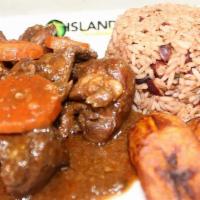 Brown Stew Chicken (Large) · Our Brown Stew Chicken is very delicious. Served with steamed cabbage and your choice of whi...