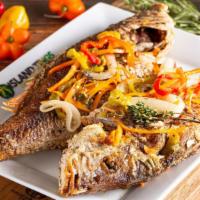 Escovitch Fish (Large) · Our Escovitch Fish is very tasteful. We use a large sized Snapper!