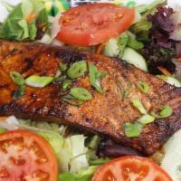 Salmon Salad (Lightly Jerked) · Our Salmon Salad is lightly jerked to perfection. We offer Italian, Ranch, French, Thousand ...