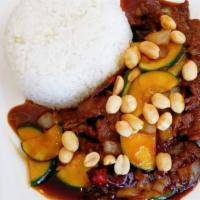 Chinese Kung Pao  / 宫保盖饭 · Spicy. Stir-fried zucchini, onion with homemade spicy brown sauce, peanut on top.