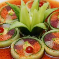 Naruto Cucumber Roll · Riceless, salmon, tuna, yellowtail, avocado, shredded carrots, cucumber wrap, spicy ponzu sa...