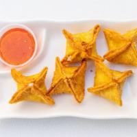 Crab Rangoon · crispy wonton shells filled with crab meat and cream cheese.