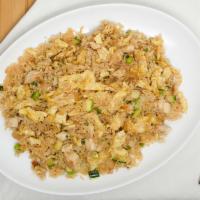 Famous Fried Rice · Choose up to three proteins with egg, zucchini, carrots, and scallions.