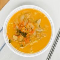 Yellow Curry Noodle Soup · Choice of protein - spicy coconut curry broth with thick egg noodles, potatoes, carrots and ...