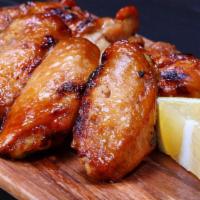 Chicken Wings · Wings Flavors HOT- MILD- BBQ- LEMON PEPPER- TERIYAKI -CAJUN- RANCH- GARLIC- SWEET AND TANGY.