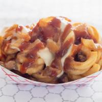 Dirty Fries · Curly Fries with Gravy, Provel Cheese, Caramelized Onions, Round Sauce.