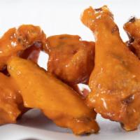 Chicken Wings · Available in Creamy Buffalo, Hot Buffalo, TR Glaze, Honey Sriracha, BBQ, Teriyaki, Garlic Pa...
