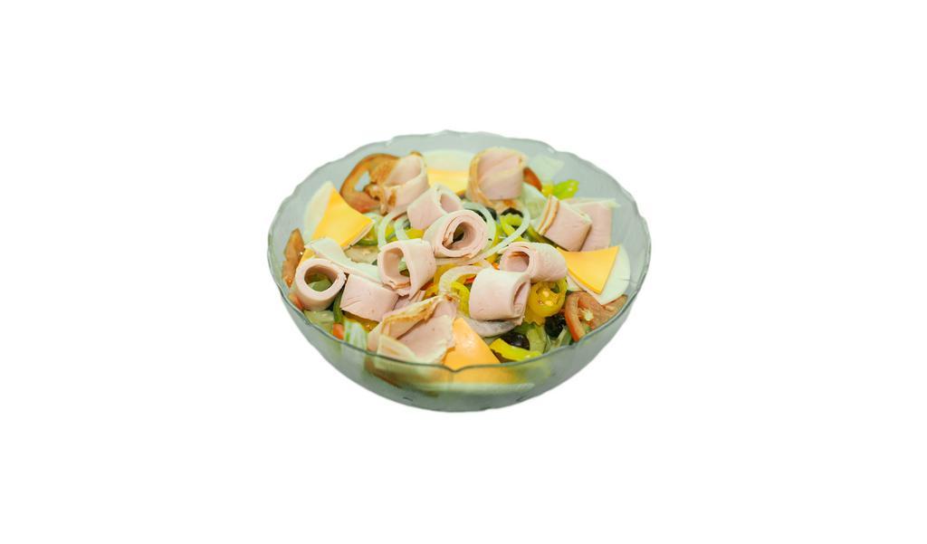Turkey Breast Salad · Garden salad topped with antibiotic-free, sustainably farmed roasted turkey breast.
