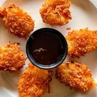 Coconut Shrimp · Eight coconut shrimp served with a honey glaze orange sauce.