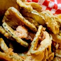 Fried Pickles · Lightly fried pickle spears served with ranch dressing.