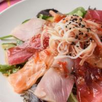 Sashimi Spicy Salad · Three sashimi rockstars- red tuna, salmo, yellowtail- crab stick and cucumber piled on sprin...
