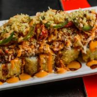 Vip Roll · Shrimp tempura, crab meat, and cream cheese. Served fried or baked. Topped with baked crab m...