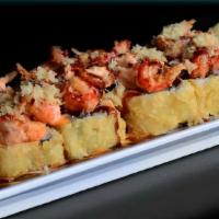 Jailhouse Roll · Tempura shrimp and cream cheese roll deep-fried and topped with baked seasoned crawfish, spi...