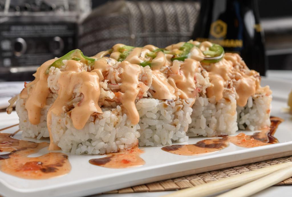 Electric Roll  · Cajun-seasoned crawfish, cream cheese, crab stick inside, baked crab stick and jalapeños outside, topped with spicy mayo, sweet chili and eel sauce. Will it make you famous? Maybe.