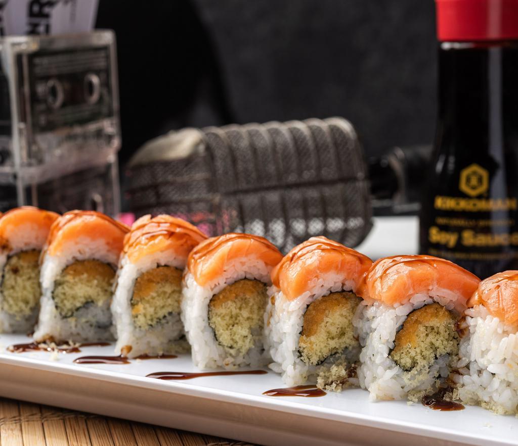 Super Crunch Roll · Crunchy flakes and spicy mayo topped with smoked salmon and eel sauce.