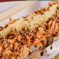 Volcano Roll · California roll topped with baked crab meat, eel sauce, spicy mayo, and crunchy flakes. The ...