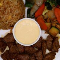 Filet Hibachi · Served with fried rice and vegetables.