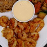 Shrimp Hibachi · Served with fried rice and vegetables.