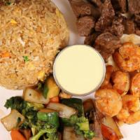 Filet Mignon & Shrimp Hibachi · Served with fried rice and vegetables.