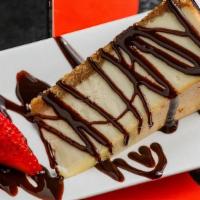 Fried Cheesecake · Served with caramel and chocolate sauce.