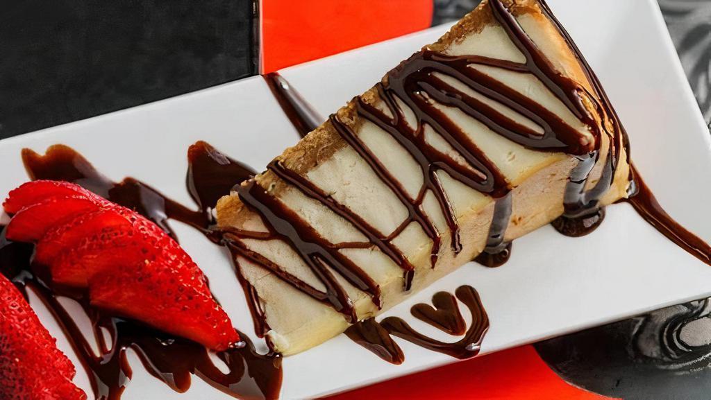 Cheesecake · (ORIGINAL OR FRIED) Creamy slice of. traditional cheesecake drizzled with chocolate and caramel, topped with. whipped cream and strawberries. Not-so-traditional? Get it fully fried.