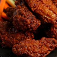 Nashville Hot Wings · Medium heat 8 pieces Nashville hot wings. Comes with classic style bone-in or boneless wings...