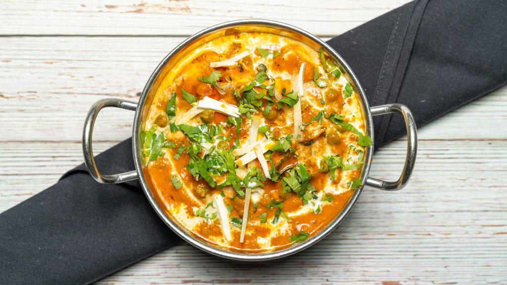 Mattar Paneer · Fresh cottage cheese cubes prepared with green peas.