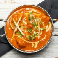 Chicken Tikka Masala · A dish of international acclaim. Chunks of chicken roasted in a clay oven and cooked in a ri...