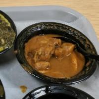 Chicken Curry · Chicken cooked with a delicately spiced curry sauce.