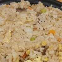 Hibachi Steak Fried Rice · Savory Hibachi-style rice with carrots, onions, eggs, & side of Yum Yum Sauce.