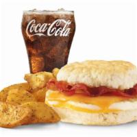 Bacon, Egg & Cheese Biscuit Combo · A fresh-cracked grade A egg on a fluffy buttermilk biscuit with Applewood smoked bacon and m...