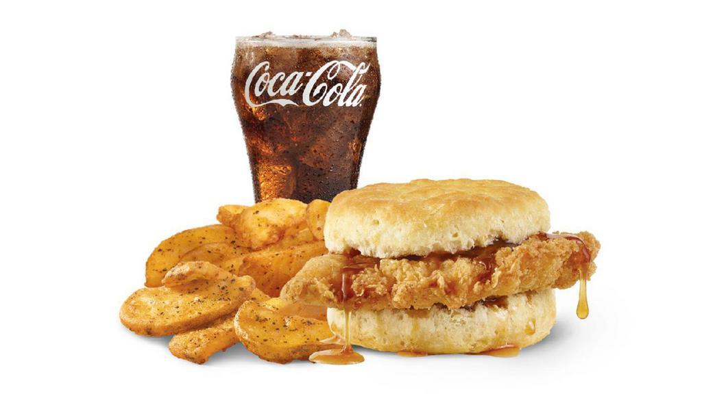 Hot Honey Biscuit Combo · A crispy, chicken fillet, perfectly seasoned and topped with maple honey butter on a fluffy buttermilk biscuit. It’s sweet, it’s savory, and it’s a great reason to get out of bed in the morning.