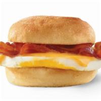 Classic Bacon, Egg & Cheese Sandwich · A fresh-cracked grade A egg, Applewood-smoked bacon, and melted American cheese on a warm br...