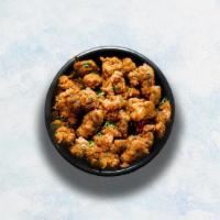 Chicken Pakora · Chicken batter-fried to perfection and seasoned with herbs.
