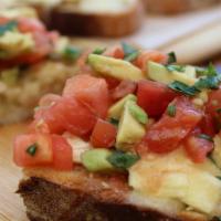 Bruschetta Avocado · brie, avocado, fresh seasoned tomato