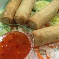 Vegetable Spring Rolls · Sweet chili drizzle and cilantro.