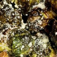 Crispy Brussel Sprouts · Bacon, parmesan, and red wine vinegar.