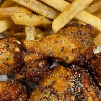 Chicken Wings · Chicken wings tossed in our signature sauce mild, hot, extra hot, jerk, bbq, lemon pepper, c...