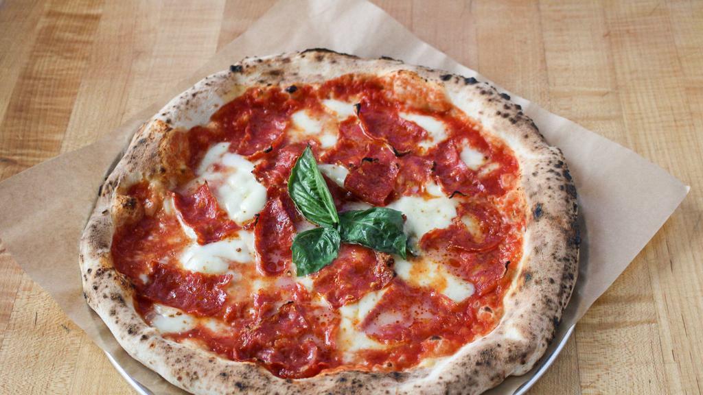 Spicy Salami · Margherita with spicy salami.