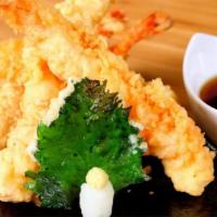 A6 Shrimp Tempura · Regular.
Deep fried shrimp with teriyaki sauce.