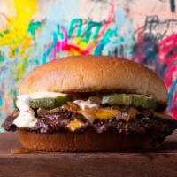 Smash Cheeseburger · fine ground brisket &  angus smashed patty, american cheese and our dirty sauce on a Martin'...