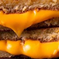 Grilled Cheese · Perfect grilled american cheese on a reverse Martin's famous potato roll