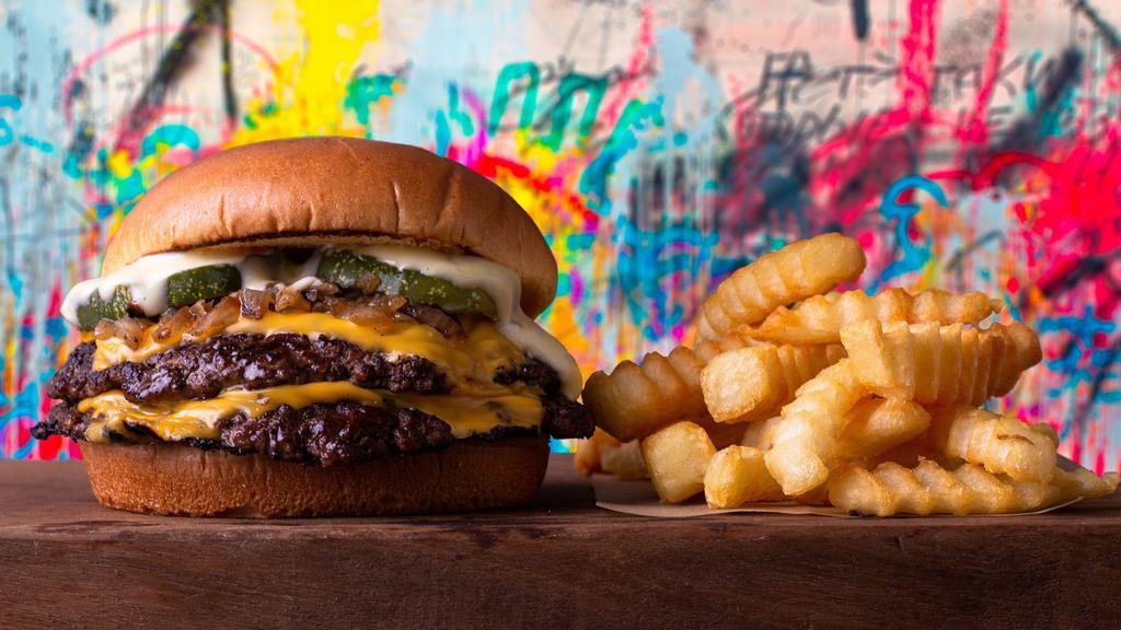 Smash Double Cheeseburger Combo. · Comes with your choice of side and drink.