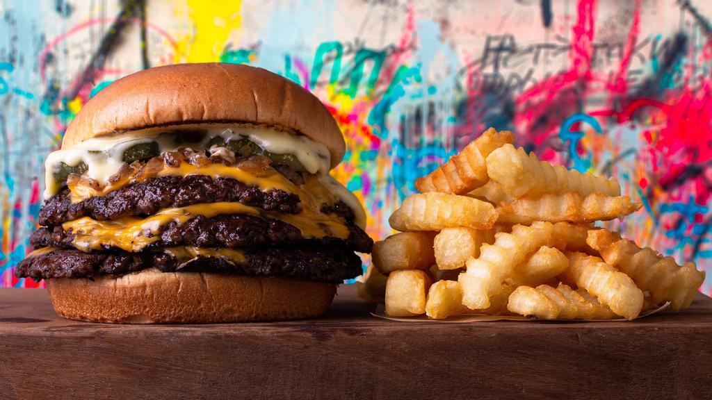 Smash Triple Cheeseburger Combo · Comes with your choice of side and drink.