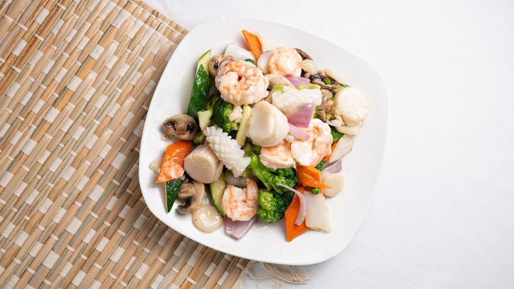 Seafood Delight · Jumbo shrimp, scallop, and crab meat with mixed vegetables in white sauce.