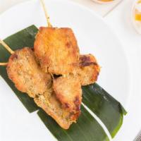 Chicken Satay · Grilled marinated chicken breast on skewers served with peanut sauce.