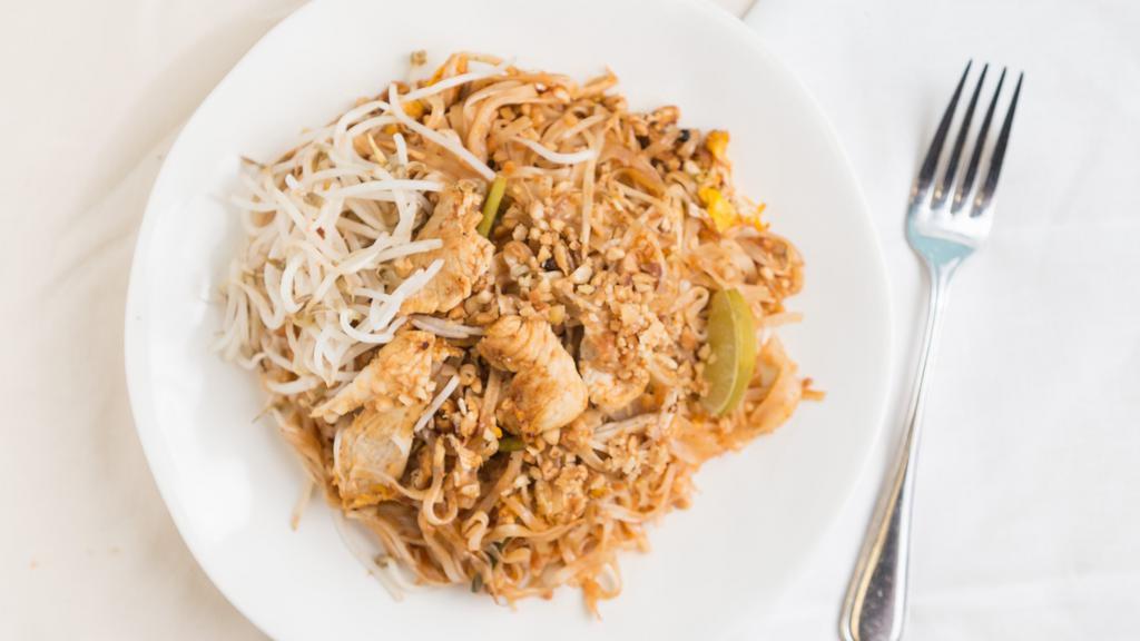 Pad Thai · Thin rice noodle, egg, chives, bean sprout, topped with crushed peanut, fresh bean sprout, lime wedge.