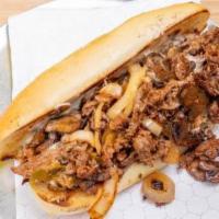 Buffalo · Loaded with steak, onions, jalapenos, hot wing sauce, Super Melty Cheese (American).
