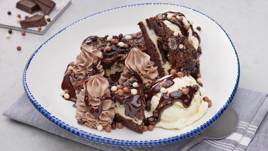New! Triple Chocolate Typhoon · A shareable celebration of chocolate! Warm brownies with OREO® cream and cookie crumbles, vanilla ice cream and chocolate mousse, finished with warm GHIRARDELLI® Chocolate Sauce.. 1380 Cal