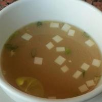Miso Soup · Soybean paste soup with seaweed, tofu, and scallions.
